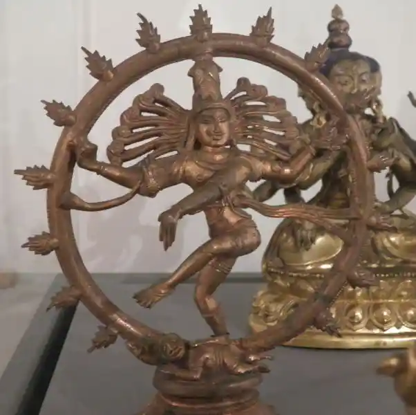 Four-armed dancing shiva inside a circle with flame-like rays